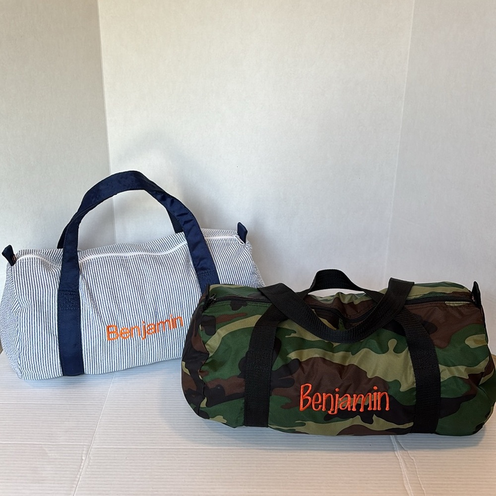Mint Duffel Bags w/ name ‘Benjamin’ 1 is blue & white strip & 1 is camoflauge